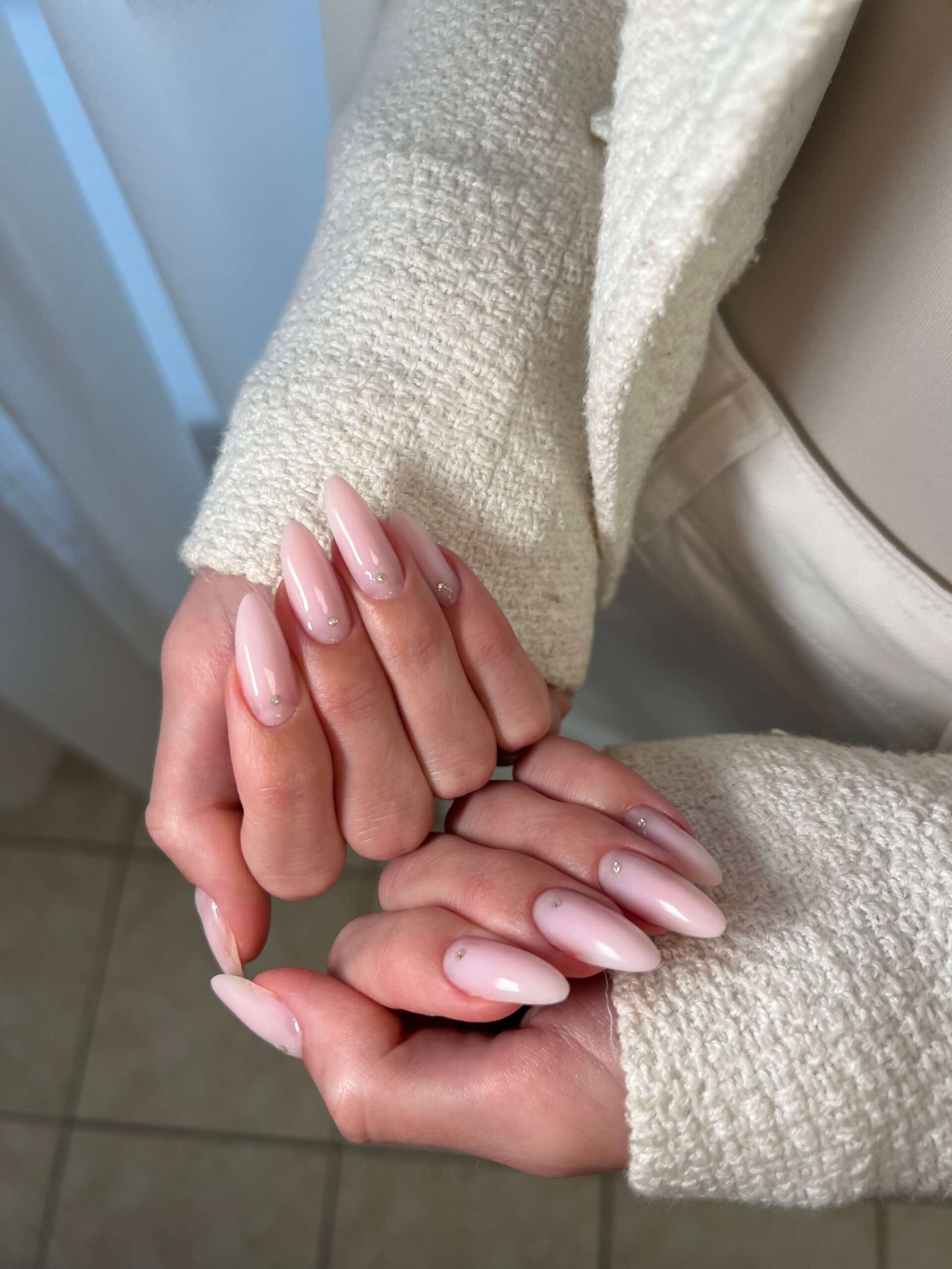 Friendly staff member consulting with a client at front desk